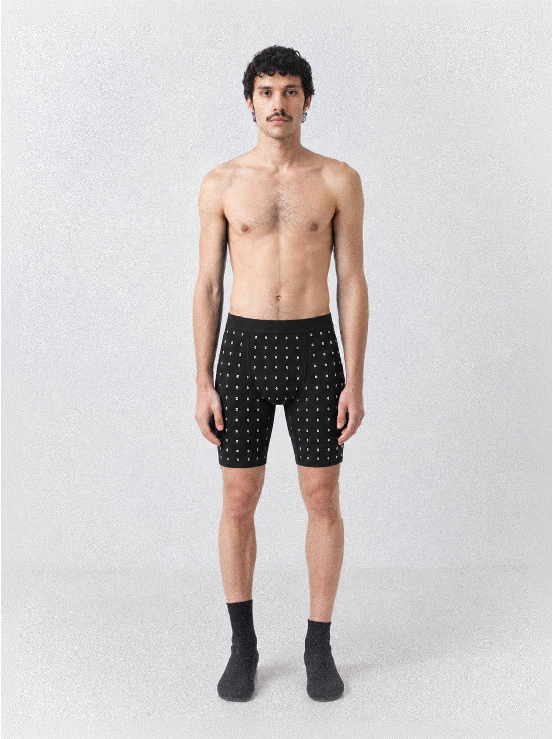 Lament Stud Tights worn — black half tights covered in a grid of polished metal studs