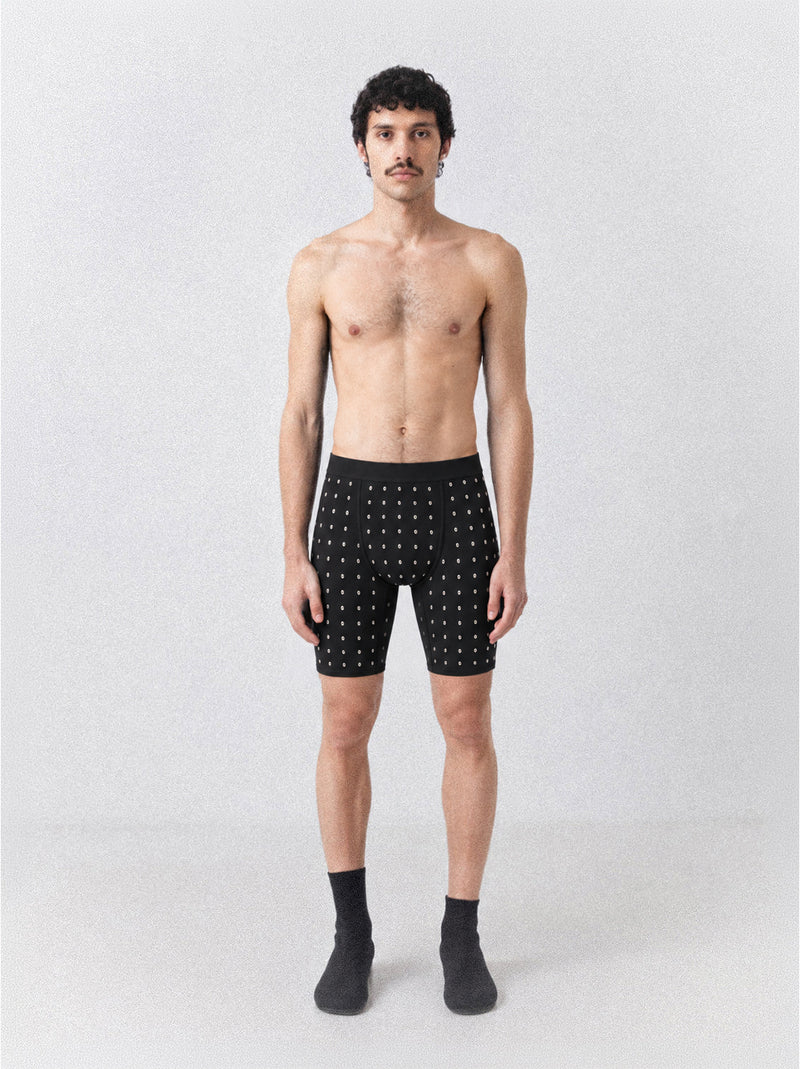 Lament Stud Tights worn — black half tights covered in a grid of polished metal studs