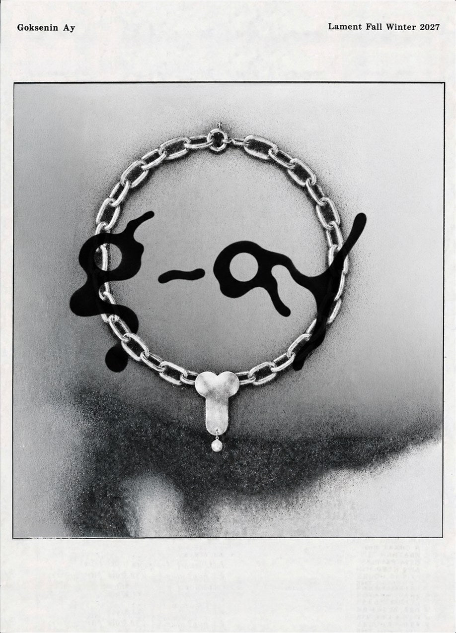 Goksenin Ay, Lament Fall Winter 2027 — chain collar with the G-AY mark